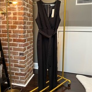 Pocketed Black Jumpsuit by DO+BE purchased on VICI